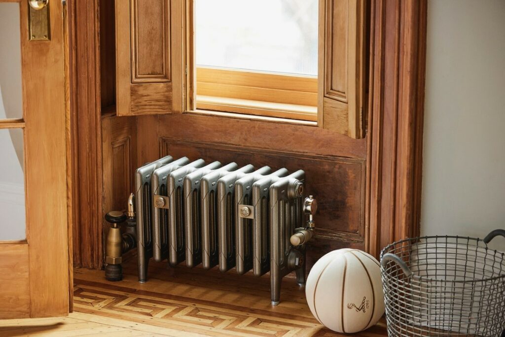 Steam radiator with TRV temperature controls in Brooklyn brownstone home